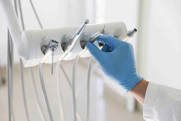 Professional Invisalign Clear Aligners technician working in Pecan Grove, TX